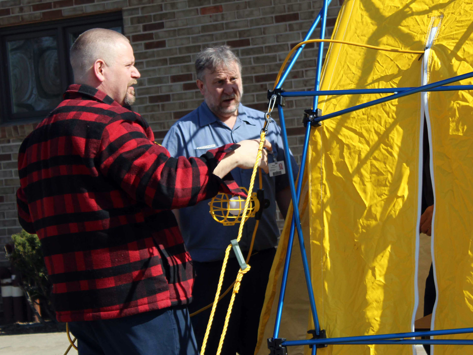 Kevin and Larry set up tent RAMC coronavirus